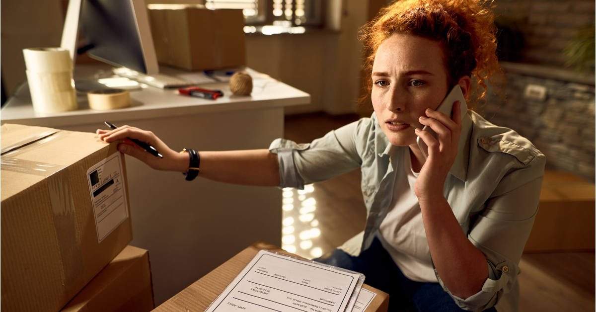 Retail customer service agent handling a parcel returns issue over the phone