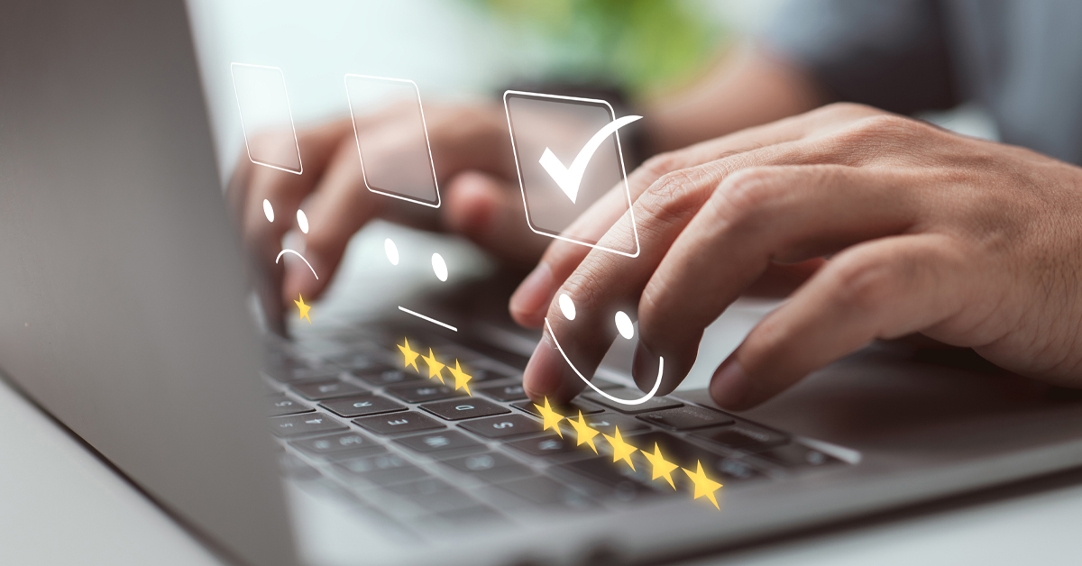 A laptop displaying guest reviews from different global audiences. 