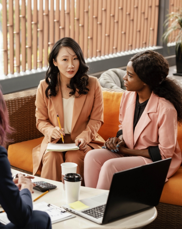 Professional team collaborating in a modern workspace, representing Korean translation and localization