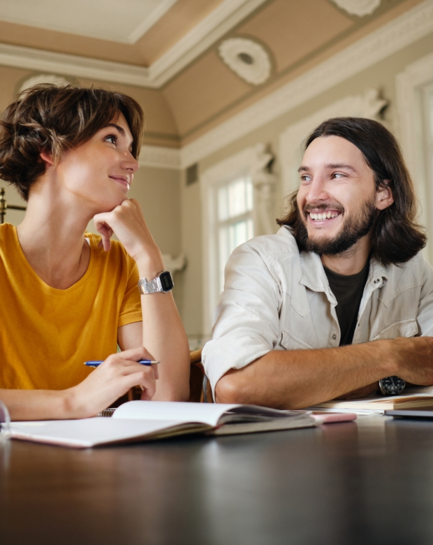 Focused business professionals reviewing documents, representing Macedonian linguistic services