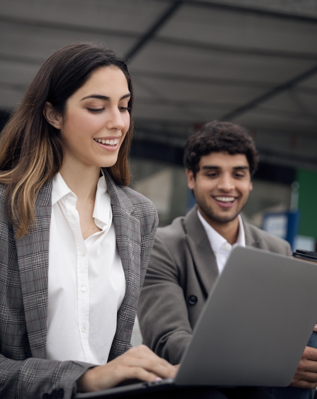 Corporate partners reviewing global market reports, representing Spanish localization and translation