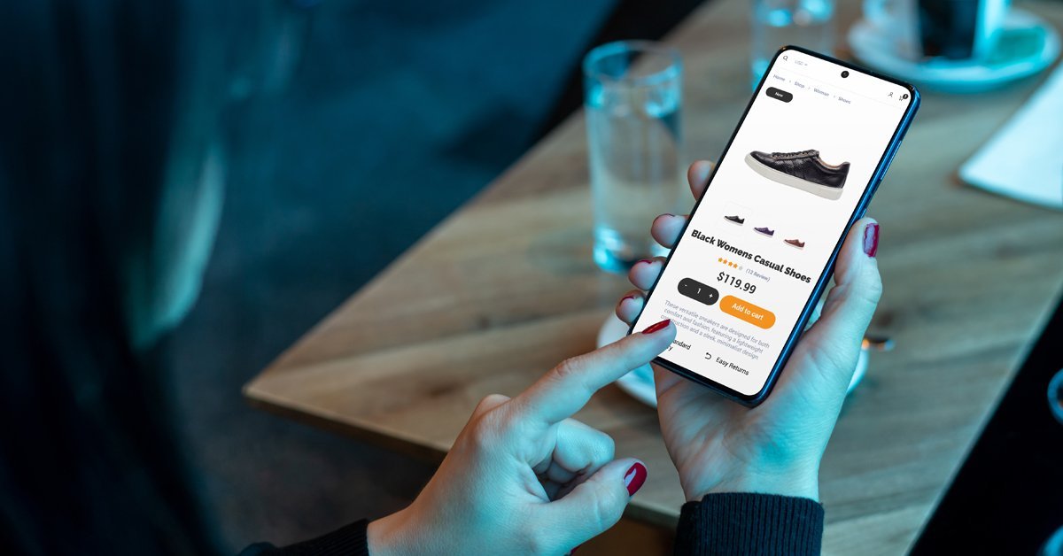 Woman browsing a shoe product page on her smartphone, illustrating AI personalization in retail