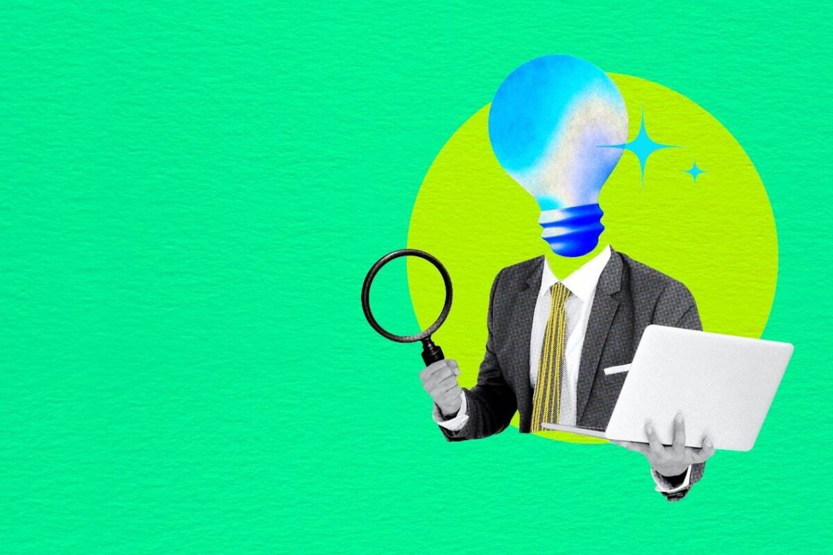Creative illustration of a suited figure with a lightbulb head holding a magnifying glass and laptop, representing market research insight and discovery