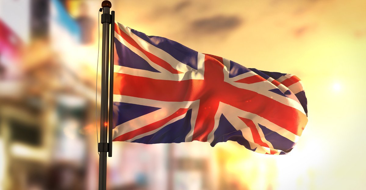 UK flag at sunrise, representing post-Brexit food and beverage packaging design requirements for the Great Britain market