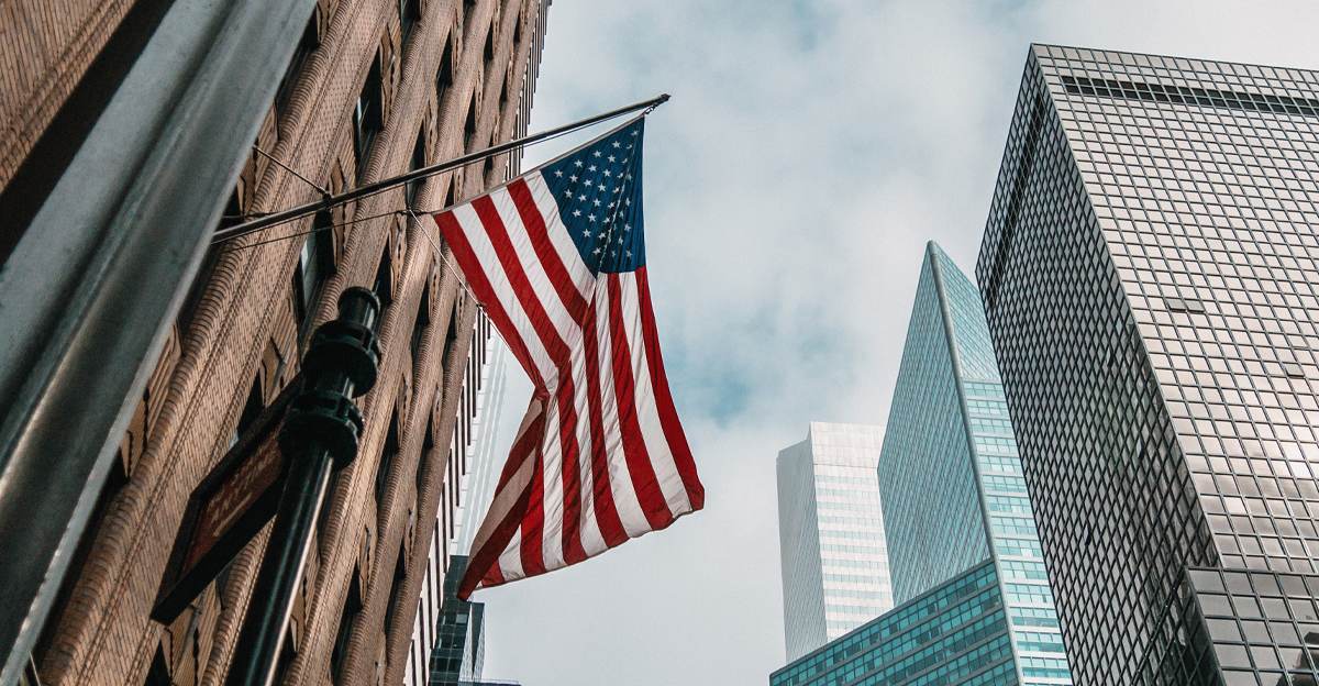 American flag on a city building, representing FDA food and beverage packaging design requirements for the US market