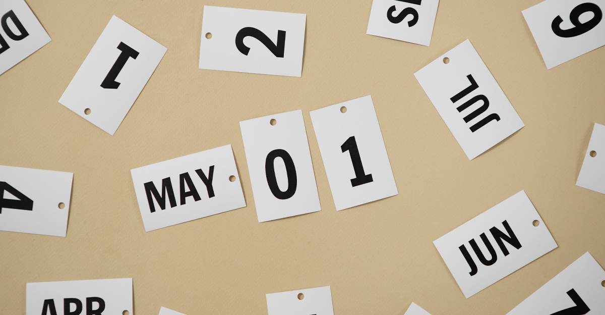 Scattered calendar date cards showing different months and days