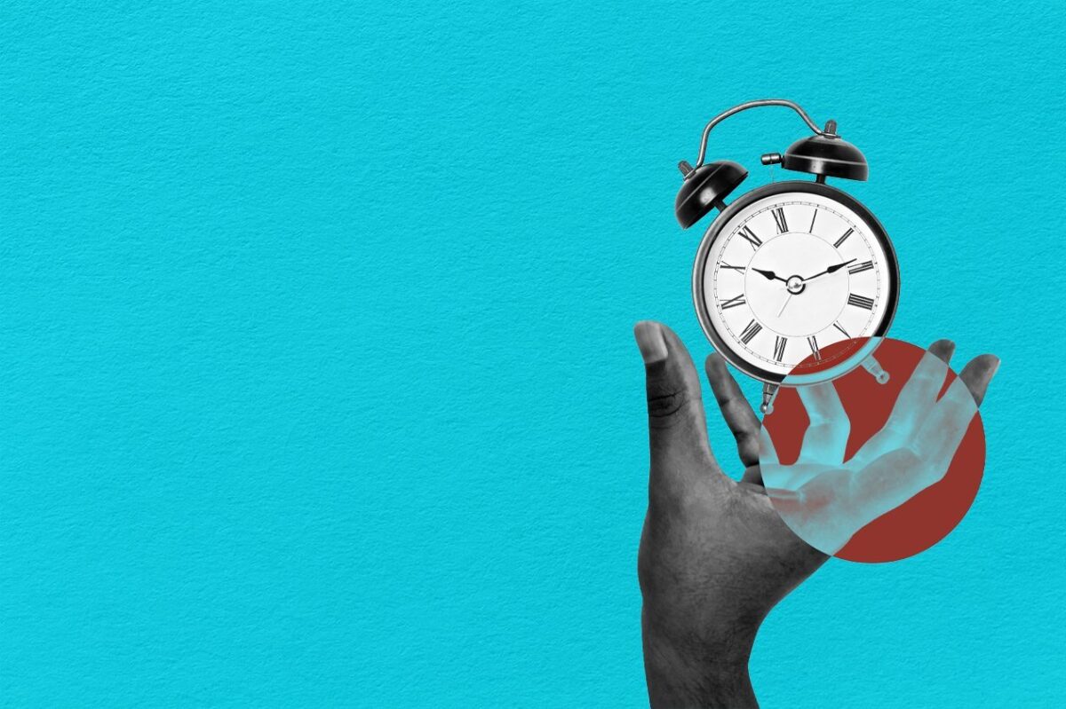 A hand reaching for a clock on a teal background, illustrating how to prevent translation bias in global surveys