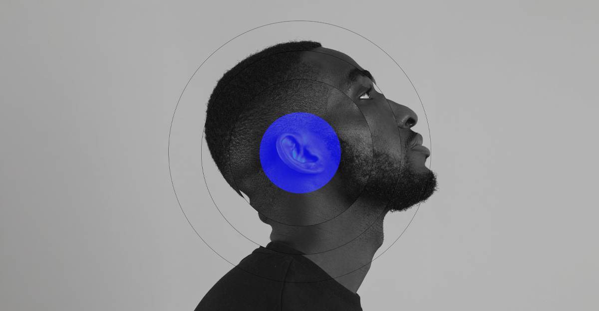 A close-up profile of a man's head with a glowing blue circle over his ear, symbolizing focused listening