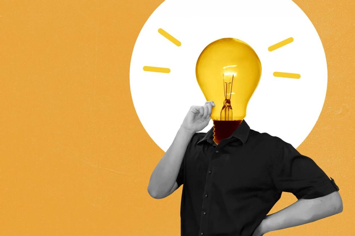 A person with a glowing lightbulb in place of their head, representing what makes a good focus group moderator